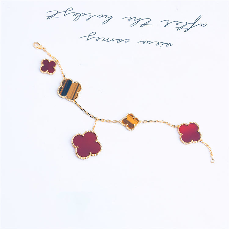 Lumi® Kleeblatt-Armband mit 5 Motiven: Karneol, Tigerauge