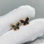 Lumi® Schmetterlings-Ohrringe in dunklem Perlmutt-Design