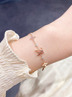 ¡®Lumi¡¯STAR AND SUN 7 MOTIFS GOLD BRACELET