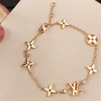 ¡®Lumi¡¯STAR AND SUN 7 MOTIFS GOLD BRACELET