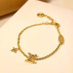 ¡®Lumi¡¯LOGO STAR MOTIF GOLD BRACELET