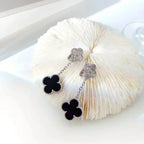 Lumi® Ohrringe mit Kleeblattmotiven, Diamant und Onyx, Silber