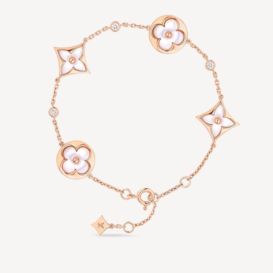 ¡®Lumi¡¯STAR AND SUN 4 MOTIF WHITE MOP PINK GOLD BRACELET