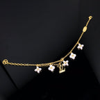¡®Lumi¡¯LOGO 6 MOTIF STAR AND SUN GOLD BRACELET
