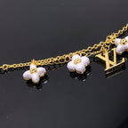 ¡®Lumi¡¯LOGO 6 MOTIF STAR AND SUN GOLD BRACELET