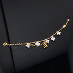 ¡®Lumi¡¯LOGO 6 MOTIF STAR AND SUN GOLD BRACELET