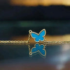 Lumi® Butterfly Türkisfarbenes Schmetterlingsarmband
