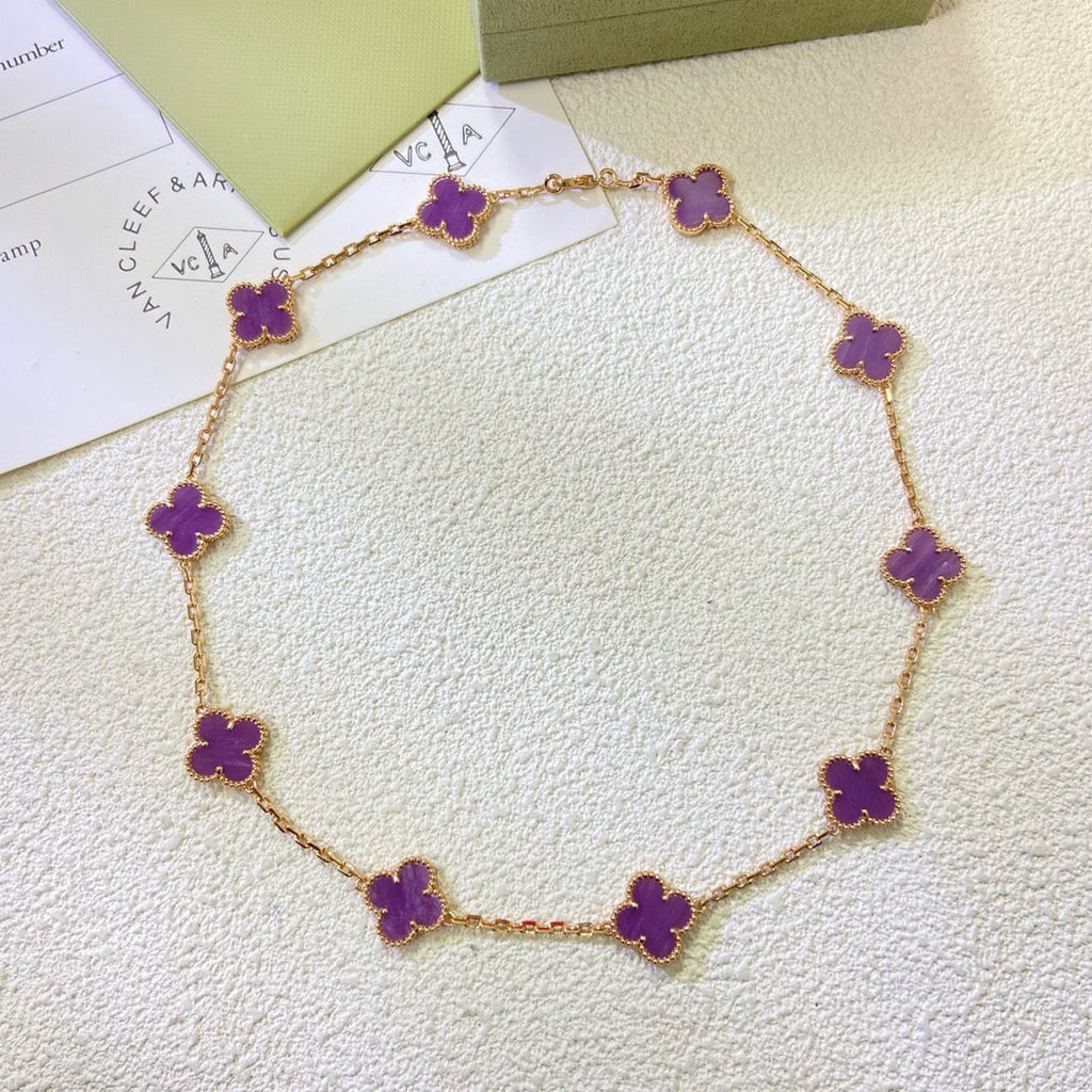 Lumi® Kleeblatt-Halskette mit 10 Motiven, lila-violett