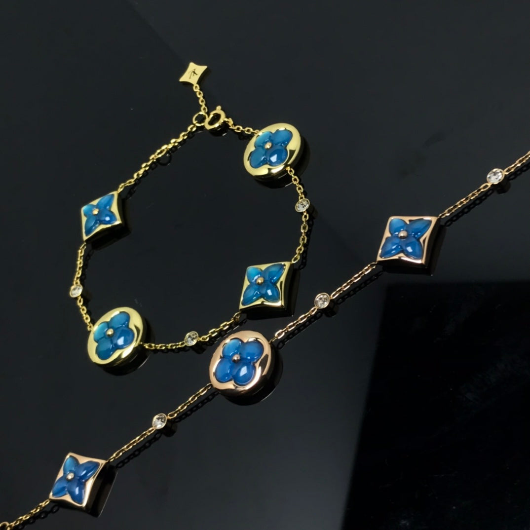 ¡®Lumi¡¯STAR AND SUN 4 MOTIF BLUE BRACELET